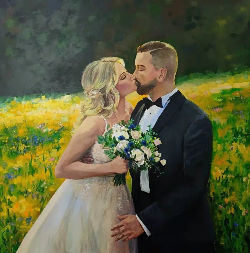 Live wedding painting of newlyweds sharing their first kiss in a wildflower meadow